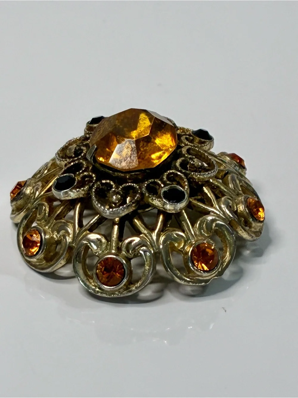 Coro Gold-Tone Heart Shaped Ornate Filigree Brooch with Amber and Black Stones